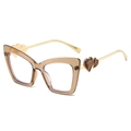 Cat eye glasses frame in translucent tea resin with gold heart-detailed temples - Brown