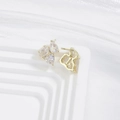Detailed close-up of heart and pear-cut zircon earrings in a gold-plated setting - Heart and Pear Combination Style (EP6022-Gold)