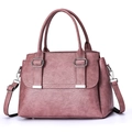 Minimalist large capacity faux leather shoulder bag in dusty rose with fringe detail - Pink