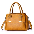 Ginger yellow large capacity leather tote bag with tassels and detachable shoulder strap - Yellow