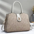 Beige faux leather handbag with lace floral texture and gold teardrop swivel lock - Gray