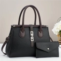 Detail of lychee pattern leather tote bag with silver buckle and matching coin purse - Black