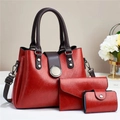 Three-piece dark red embossed leather tote bag set with glossy finish and silver hardware - Red