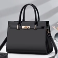 Elegant black patent leather Boston handbag with gold hardware and white contrast stitching - Black