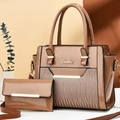 Detail of caramel crocodile pattern patent leather handbag set with gold Temutax logo - Khaki