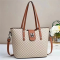 Detail of contrast stitch tote bag featuring cream quilted fabric and brown leather trim - Khaki & Mustard Yellow