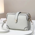 Light grey multi-layer crossbody bag with litchi texture and golden swivel lock closure - Gray