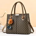 Retro dark brown crossbody bag with geometric pattern, gold clasp, and pompom charm - Khaki