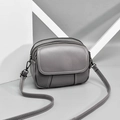 Gray lychee grain leather crossbody bag with triple compartments and white contrast stitching - Gray