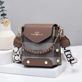 Brown checkered mini crossbody bag with leather handle and decorative text strap - Coffee