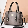 Grey crocodile texture leather handbag with glossy black trim and gold metal detail - Gray