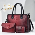 Three-piece red crocodile pattern tote bag set with black handles and gold hardware - Burgundy