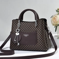 Deep brown crossbody bag with geometric pattern and Fashion Queen text detail - Quilted Coffee