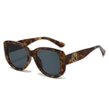 Occhiali da sole cat-eye tartarugati con montatura grande e dettaglio H dorato - Montatura Leopardata Lenti Grigie