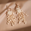 Elegant pearl flower tassel earrings with gold chains on a champagne silk background - Screw Clip-on Earrings with Artificial Pearl Tassel (Off-white-02)