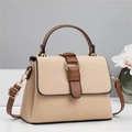 Large beige woven tote bag with brown leather handles and adjustable shoulder strap - Khaki