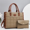 Detail of khaki pebbled leather tote bag set with square quilting and gold hardware - Khaki