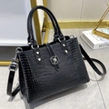 Elegant black crocodile texture handbag with silver flower lock and glossy finish - Black