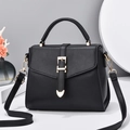Chic black litchi pattern crossbody bag with golden heart buckle and top handle - Black