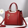 Bolso de mano rojo de piel granulada con asas doradas y colgante de perla y estrella - Granate