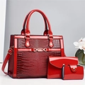 Three-piece red leather handbag set with crocodile pattern and polished gold hardware - Red