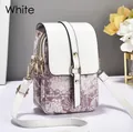 Elegante borsa a tracolla per cellulare in pelle bianca con jacquard floreale e oro - Bianco