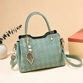 Bean green crossbody bag with rhombus embossed pattern and pearl leaf pendant detail - Mint Green