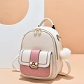 Mini cream PU leather backpack with pink quilted pocket, bee charm, and fur ball accessory - White and Pink