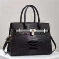 Classic black crocodile pattern tote bag with gold lock and polished glossy finish - Black