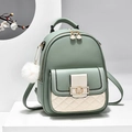 Chic light green quilted leather backpack with fluffy white pompom and metallic V-buckle - Green