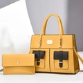 Ginger yellow tote and clutch set with decorative pockets and metallic top handles - Yellow