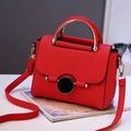 Red crossbody bag with lychee texture PU leather and black-gold circular clasp - Red