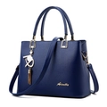 Elegant navy blue structured PU leather tote bag with gold hardware and tassel charm - Dark Blue