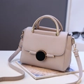 Minimalist light grey crossbody bag with lychee grain leather and circular lock - Light Gray