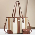 Detail view of the striped fabric texture and matching pouch on the large shoulder bag - White
