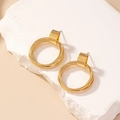 Orecchini geometrici minimalisti in oro a cerchi sovrapposti su piedistallo in pietra - Stile Cerchio (E016) / Oro