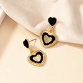 French vintage gold heart earrings with black enamel and textured metallic folds - Heart