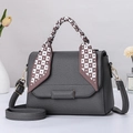 Detail of grey litchi grain leather handbag with checkerboard silk scarf wrap handle - Charcoal Grey