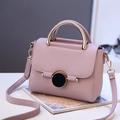 Elegant pink purple pebble leather crossbody bag with gold round handle and lock - Light Purple