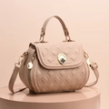 Beige quilted shell shoulder bag with floral gold clasp and adjustable strap - Khaki
