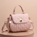 Pink quilted shell-shaped shoulder bag with clover lock and gold-tone chain strap - Pink