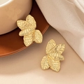 Exaggerated golden flower petal earrings with textured hammer finish in a warm set design - Gold