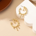 Fashionable molten metal gold water drop earrings for women with irregular liquid design - Gold