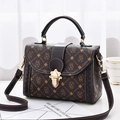 Retro brown leather crossbody bag featuring cartoon coin bag print and top handle - Money Bag Style Coffee