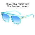 Lunettes de soleil oversize bleu transparent avec verres dégradés et charnières en Z dorées - Monture bleue transparente avec verres dégradés bleus