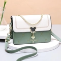 Green and white patchwork crossbody bag featuring heart quilting and mouse shaped buckle - White Cover Green Base
