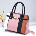 Chic four-color patchwork crossbody bag with metallic turn-lock and adjustable strap - Pink