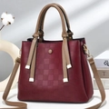 Burgundy checkered texture large tote bag with tassel accent and khaki leather handles - Red