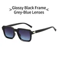Classic square sunglasses with black frame, grey-blue gradient lenses, and gold T-accents - Bright Black Frame Gray Blue Lenses