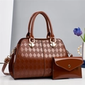 Detail of amber brown patent leather handbag with diamond lattice pattern and matching wallet - Brown